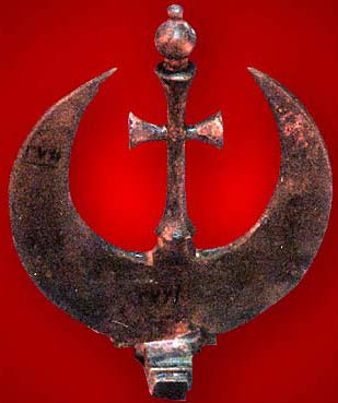 Cross shape encircled by a crescent, to show the long standing relationship between the Copts and the Muslims of Egypt, dating to sometime between the 13th and 18th centuries