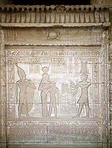 A panel from the Roman mammisi, showing a detailed relief of the pharaoh making an offering to Hathor