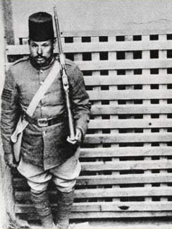 A guard at the door of the tomb of Tutankhamun during the off season